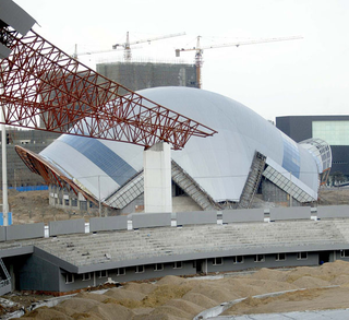 Illustration for article titled Moebius Strip Soccer Stadium Takes Shape in Shenyang